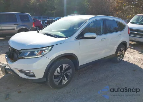 2015 Honda Cr-V Touring z USA, uszkodzony, nr VIN 5J6RM4H9XFL121982